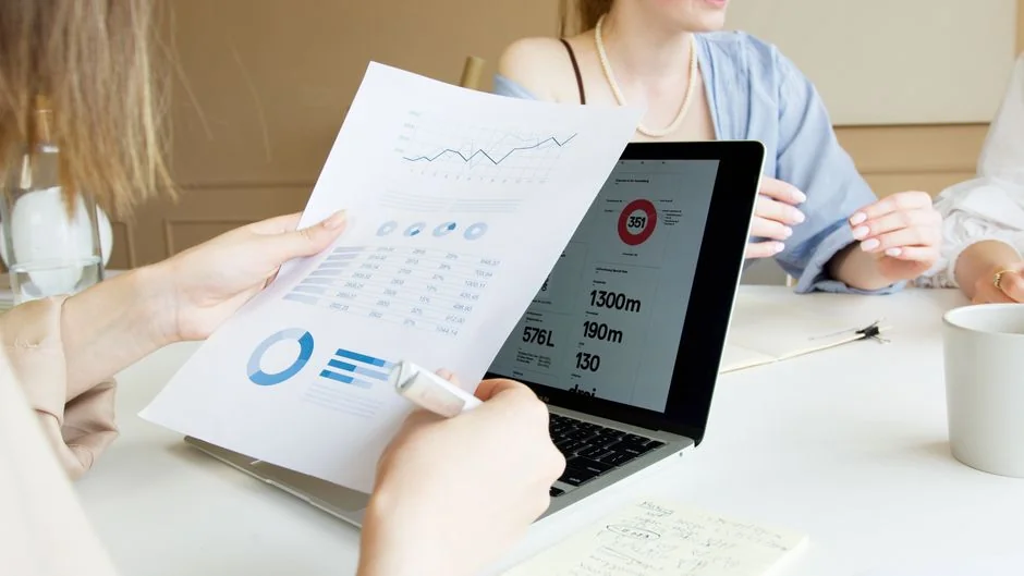 A close-up view of a marketing strategy document resting on a desk, well suited for business content.